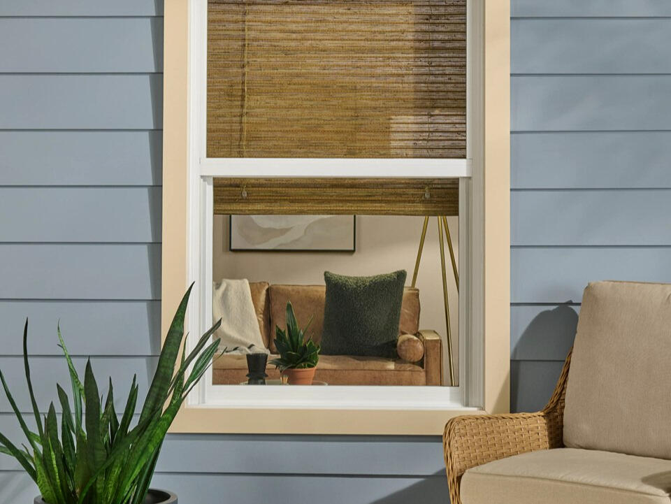 Alta Natural Woven Shades — layered natural textures that bring warmth to a room.