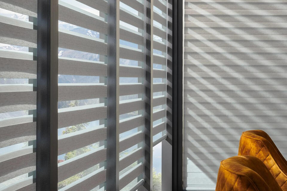Alta Banded Shades — alternating sheer and solid fabric bands for adjustable light and privacy.